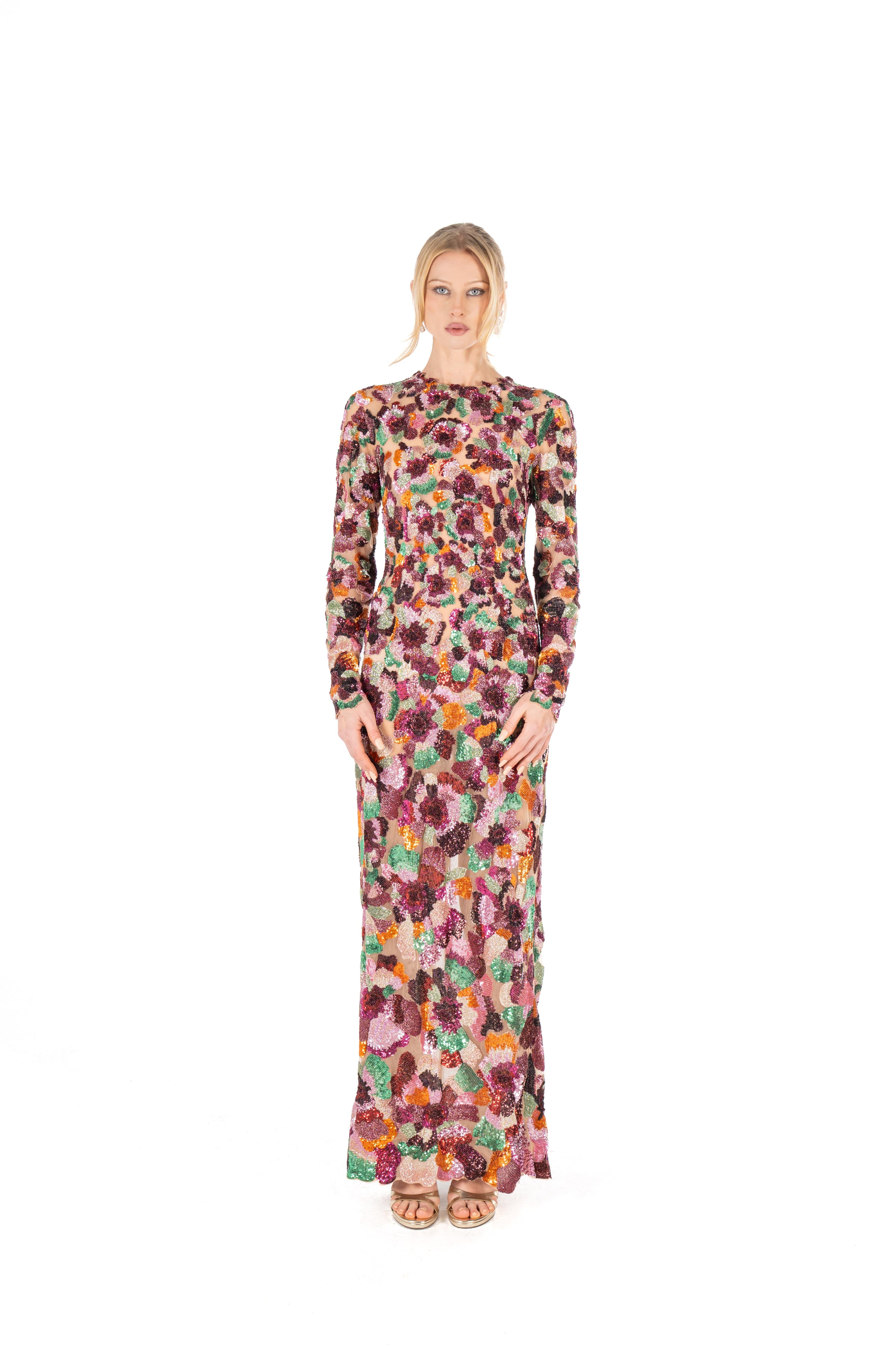 Woman wearing a floral dress on a white background